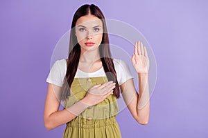 Photo of confident pretty young lady wear white t-shirt arm chest listening anthem isolated purple color background