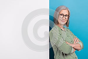 Photo of confident serious business woman crossed hands striped shirt ray ban glasses big placard empty space stats