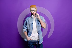 Photo of cool guy wearing modern earflaps specs casual denim outfit isolated violet background