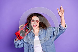 Photo of cool nice girl have fun boombox wear denim shirt isolated on violet color background