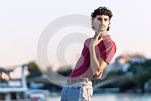 Photo with copy sapce of an effeminate young man with modern look outdoors