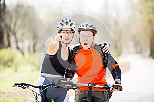 Photo of couple on bicycles