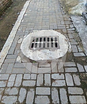 photo of cover for drainage well from rainwater