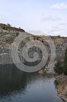 Photo that covers both a portion of the Emerald Lake and a portion of the basalt hill that surrounds it