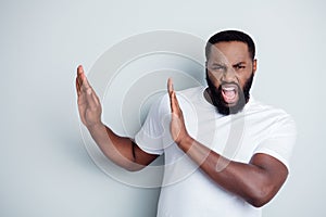 Photo of crazy yelling mad dark skin african americn guy antiracism group leader say no violence behavior to black photo