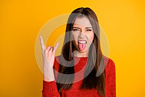 Photo of cruel rude rock fan showing you fingers crossed sticking tongue out isolated over vivid color background
