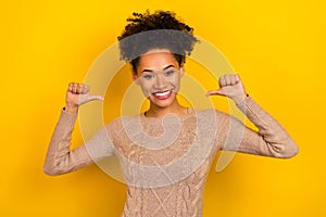 Photo of cute adorable lady dressed beige pullover pointing thumbs herself isolated yellow color background