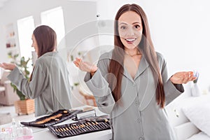 Photo of cute charming lady wear grey pajama apply maquillage preparing event indoors house bedroom