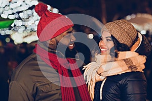 Photo of cute dreamy boyfriend girlfriend dressed winter season outfits enjoying x-mas miracle outdoors urban city