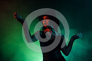 Photo of dangerous lady magician spell necromancy powerful diabolic creature from green mist background hell