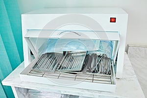 Photo of dental tools in sterilizer.