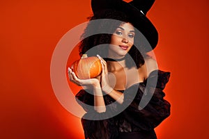 Photo of diabolic dangerous powerful witch use pumpkin vegetable for summon nightmare creature from hell