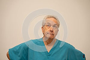 Photo of a doctor looking sideways away from camera