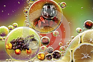 Photo double exposure of fruit apples grapes lemon nectarine and oil drops in water for background