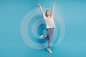 Photo of dream girlfirend lady raise hands enjoy weekend wear white t-shirt isolated on blue background
