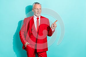 Photo of dreamy man pensioner dressed red three piece tux looking empty space isolated teal color background photo