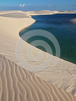 Dunes and lake - Santo Amaro, LenÃÂ§ois Maranhenses, MaranhÃÂ£o, Brazil. photo