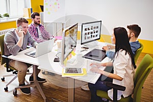 Photo editors working at creative office