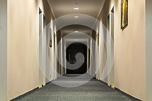 Photo of empty passageway corridor in luxury house