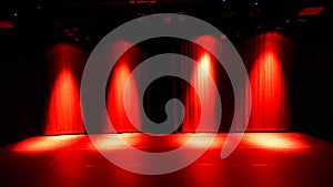 Photo of empty stage with red lighting
