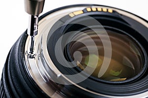 Photo equipment service, disassembling camera lens