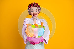 Photo of excited girl hug bucket equipment wear bath robe gloves apron isolated bright color background