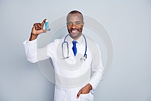 Photo of family doc dark skin guy hold inhaler asthma attack advising medical prescription against self-treatment