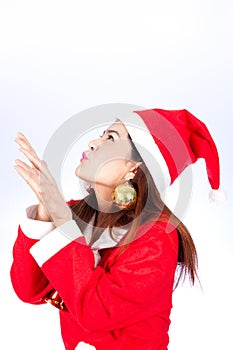 Photo of fashion Christmas Asain girl blowing something.