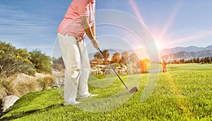 Photo of female senior golfer playing