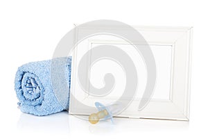 Photo frame with bath towel and boy dummy