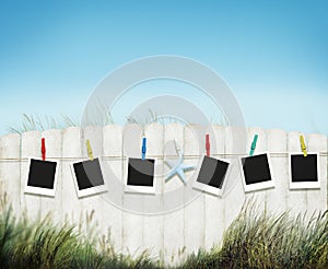 Photo Frame Picture Hanging Peg Fence Grass Sea Concept