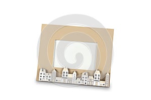 Photo frame with small houses  on white background 3D illustration