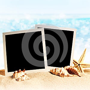 Photo frames on the sea sand