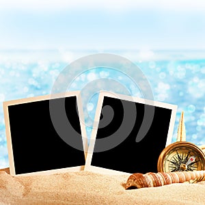 Photo frames on the sea sand