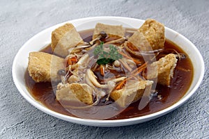 Freshly cooked Chinese food Tofu with mushroom in oyster sauce