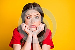 Photo of frustrated panic girl touch fists face feel fear isolated over vivid color background