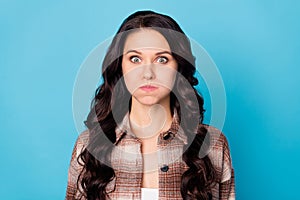 Photo of funny crazy charming lady inflate cheeks look camera wear checkered coat  blue background