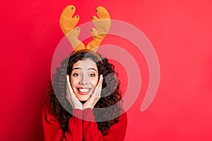 Photo of funny curly lady holding arms on cheekbones excited waiting santa claus late at x-mas night wear head horns