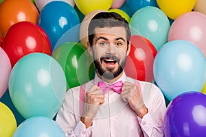 Photo of funny guy colorful design ready for birthday party surprise good mood formalwear pink shirt bow tie suspenders