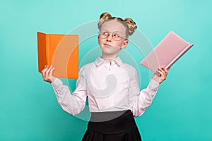 Photo of funny little girl read book wear white shirt spectacles isolated on teal background
