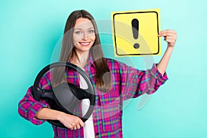 Photo of funny long hairdo young lady drive car hold warner wear checkered shirt isolated on vivid teal color background