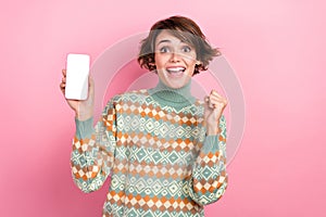 Photo of funny young student girl celebrate approved her first job notification apple phone screen isolated on pink
