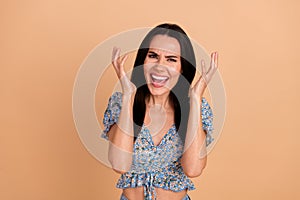 Photo of furious mad mature woman wear blue stylish clothes loud shout isolated on beige color background