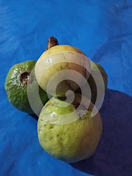 Photo of gauva fruit in blue background