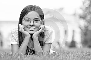 photo of girl in eyewear at lawn, banner. girl in eyewear at lawn. girl in eyewear at lawn