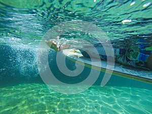 Photo of a girl on a surfboard