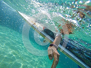 Photo of a girl on a surfboard