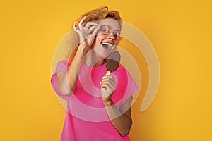 photo of glad woman with icelolly ice cream at summer. woman with icelolly ice cream