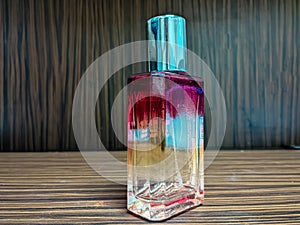 photo of a glass perfume bottle