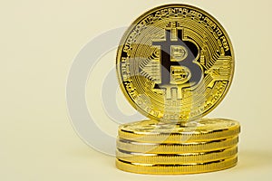 Photo Of Golden Bitcoin virtual currency coin.